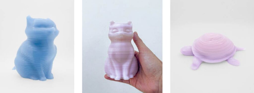 3D printed cat and turtle figurines