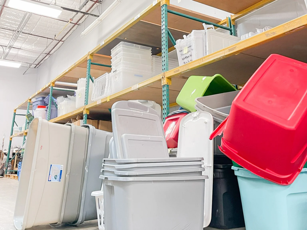 Plastic bins in storage